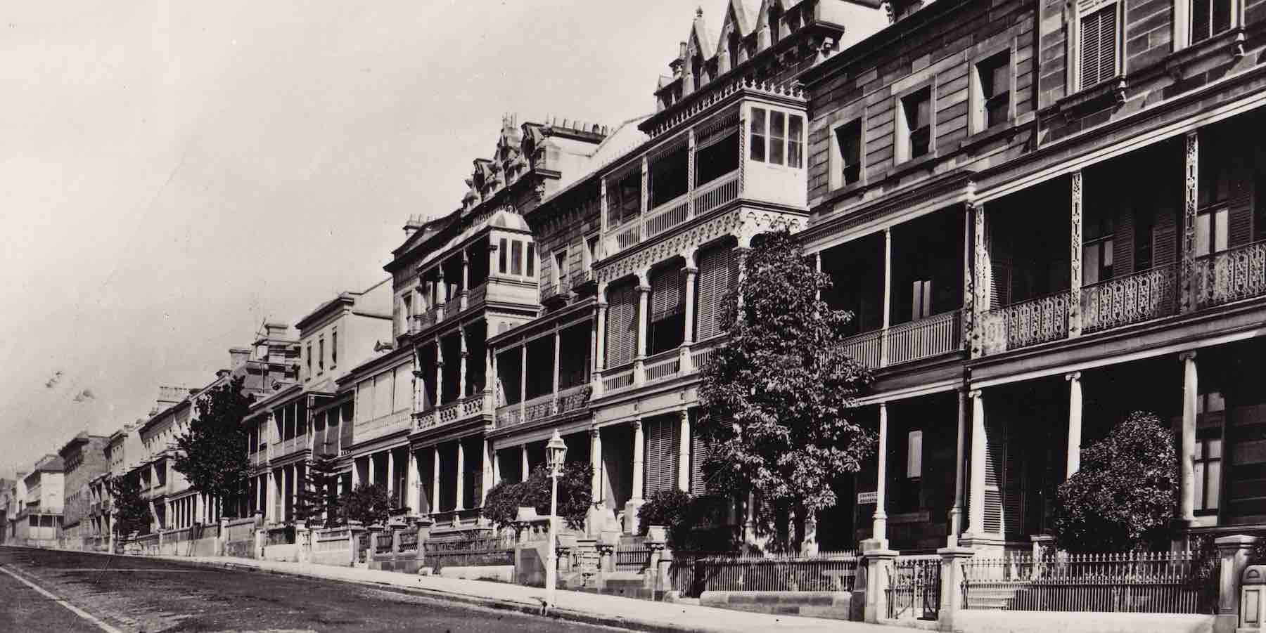 A row of townhouses along Macquarie Street circa 1870, including History House.