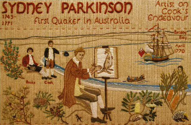 An embroidered picture that depicts Sydney Parkinson painting a kangaroo. 'First Quaker in Australia' and 'Artist on Cook's Endeavour' are embroidered above the image.