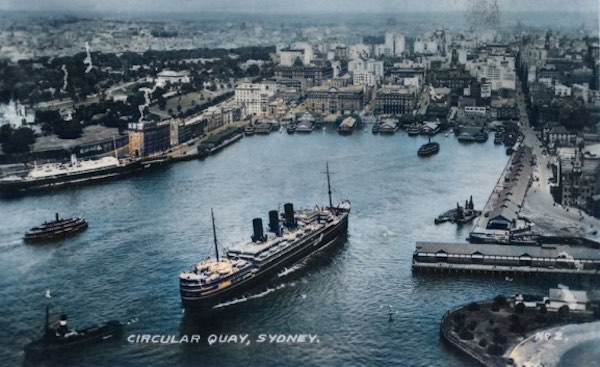 A colourised photograph of Circular Quay with a ship coming in.